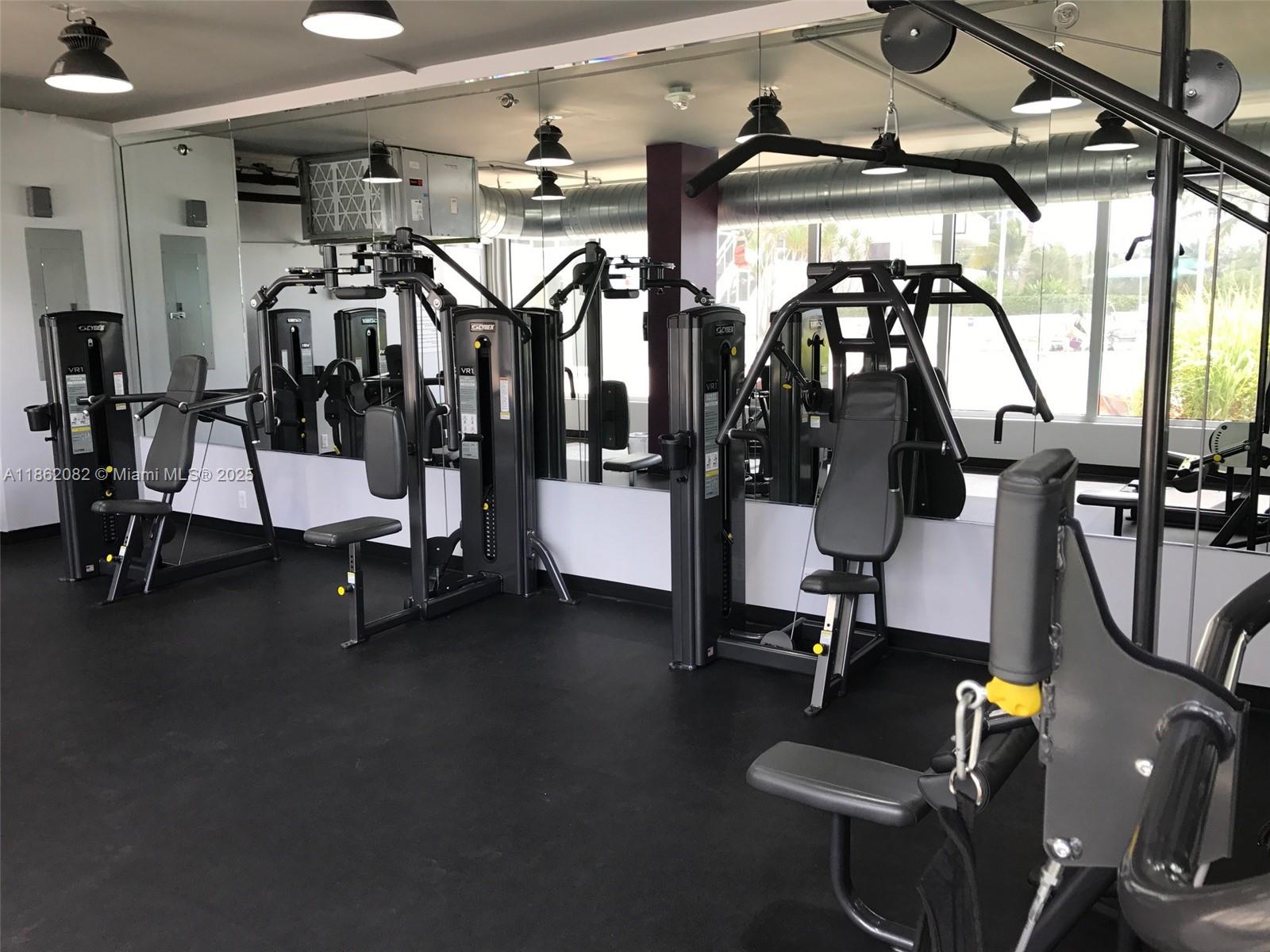100 Lincoln Road, Unit 1022 Miami Beach, FL 33139 - Photo 60 of 63 a view of a room with gym equipment