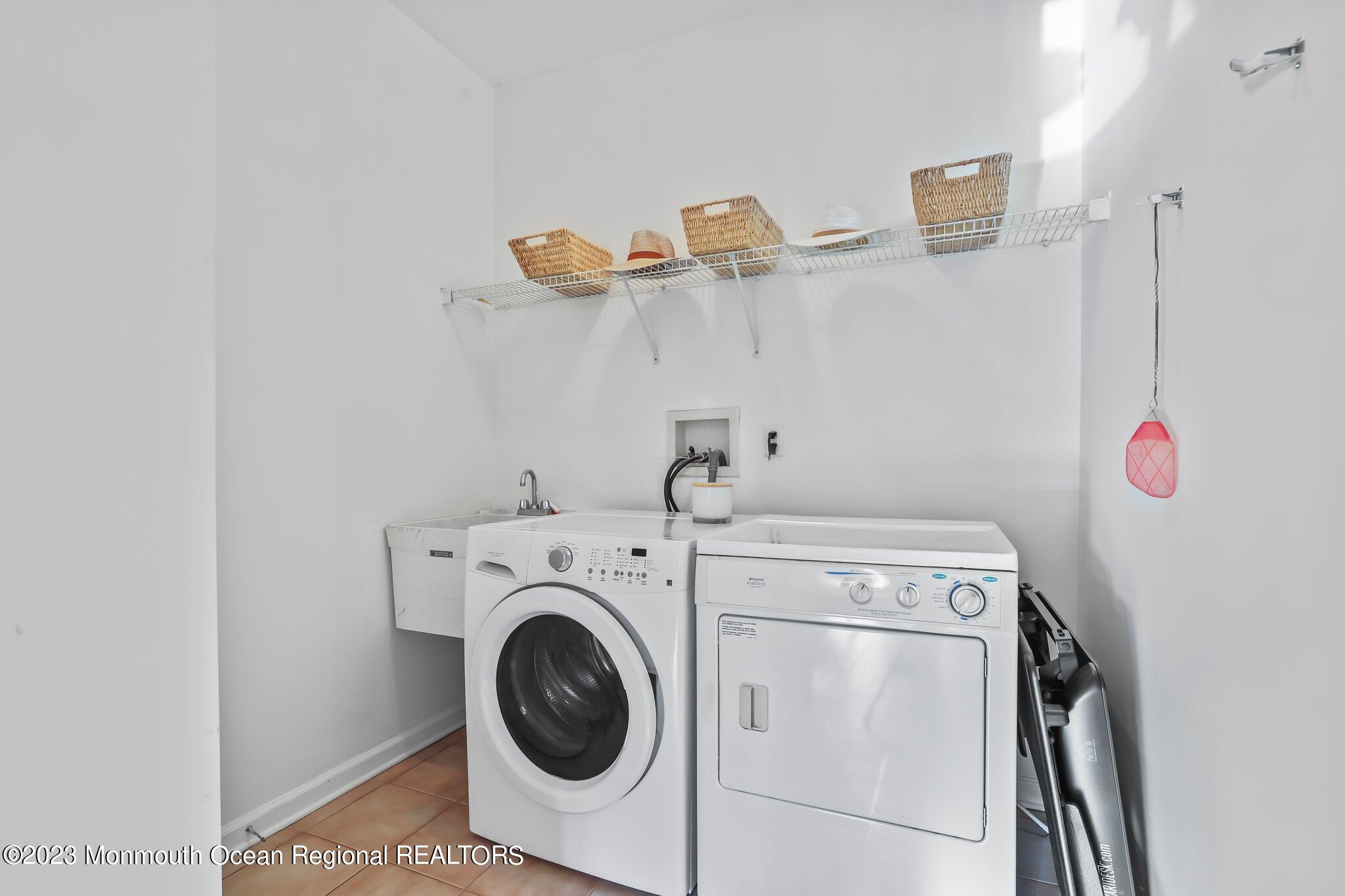20 Round Hill Road Jackson, NJ 08527 - Photo 19 of 50 a utility room with dryer and washer