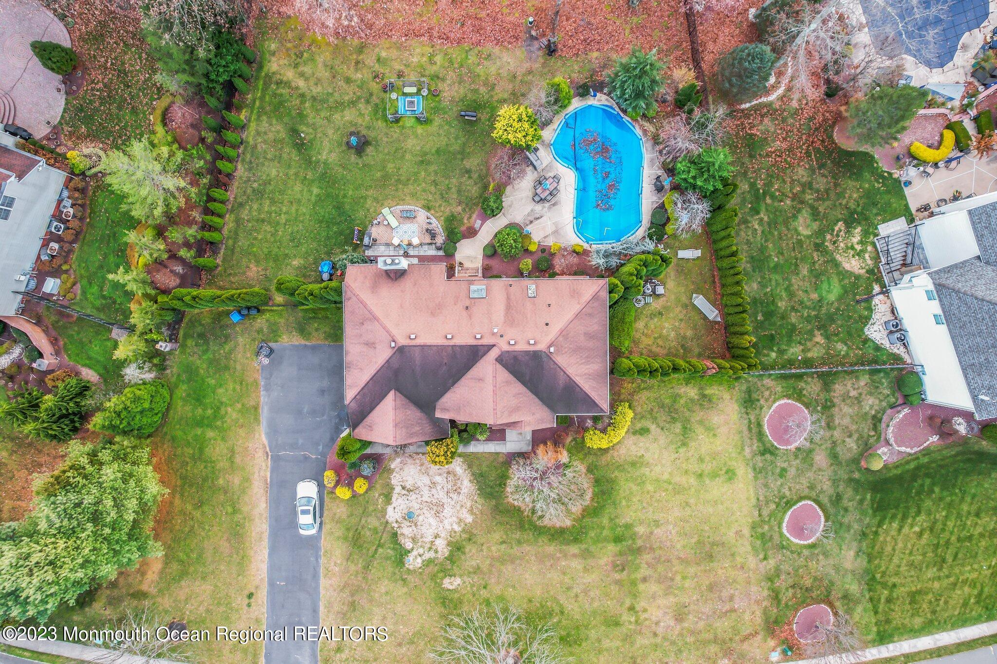 20 Round Hill Road Jackson, NJ 08527 - Photo 47 of 50 an aerial view of house and swimming pool