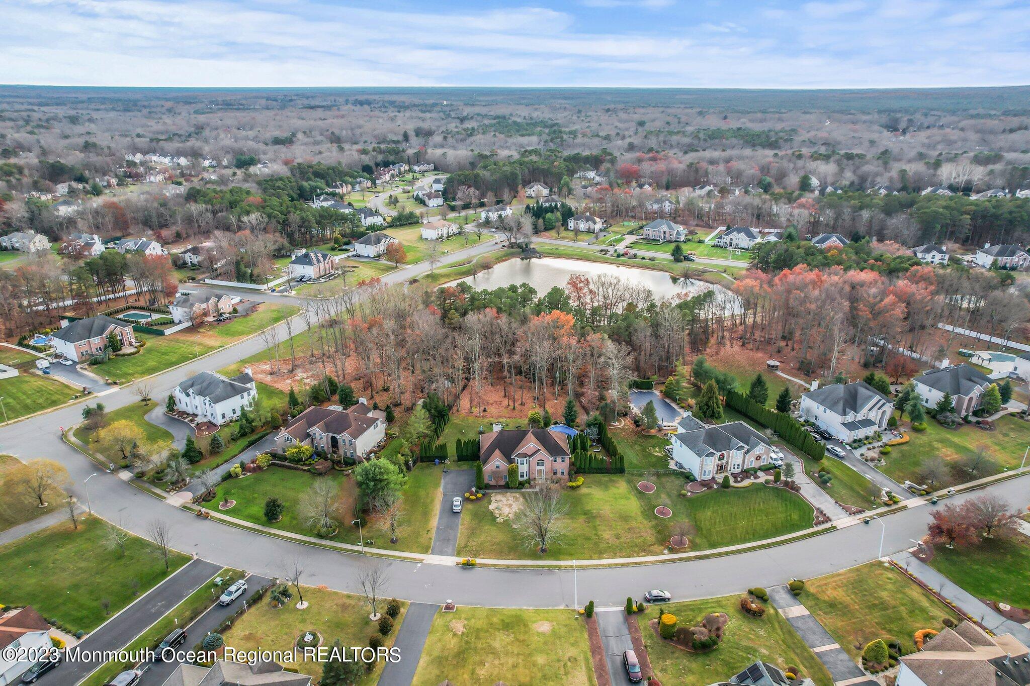 20 Round Hill Road Jackson, NJ 08527 - Photo 49 of 50 an aerial view of residential houses with outdoor space and swimming pool