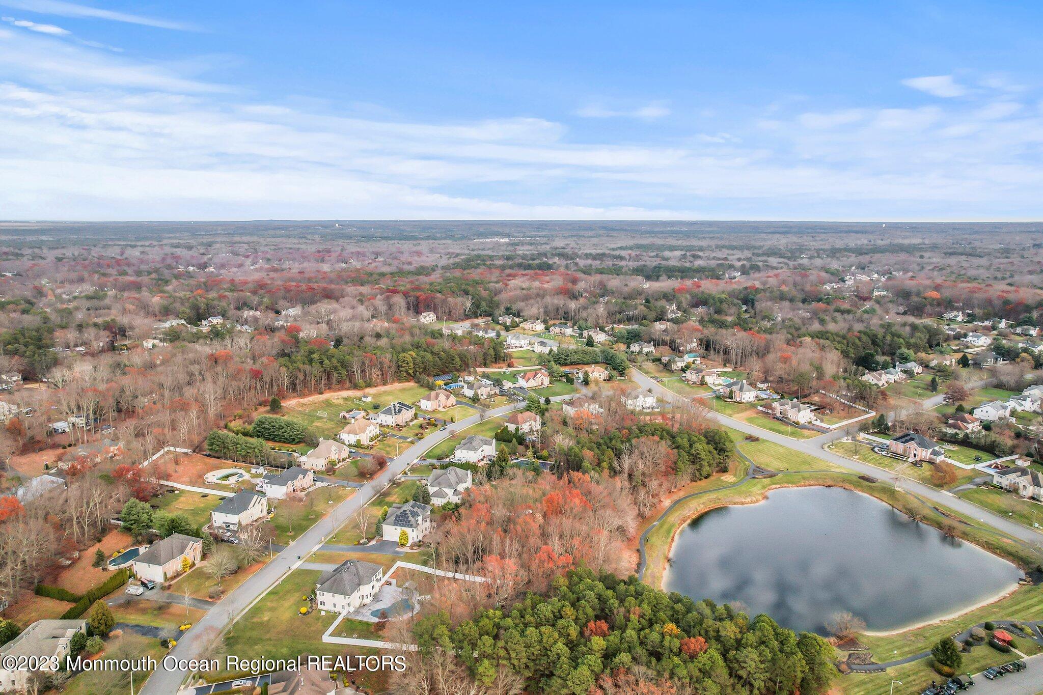 20 Round Hill Road Jackson, NJ 08527 - Photo 50 of 50 an aerial view of residential houses with outdoor space and trees