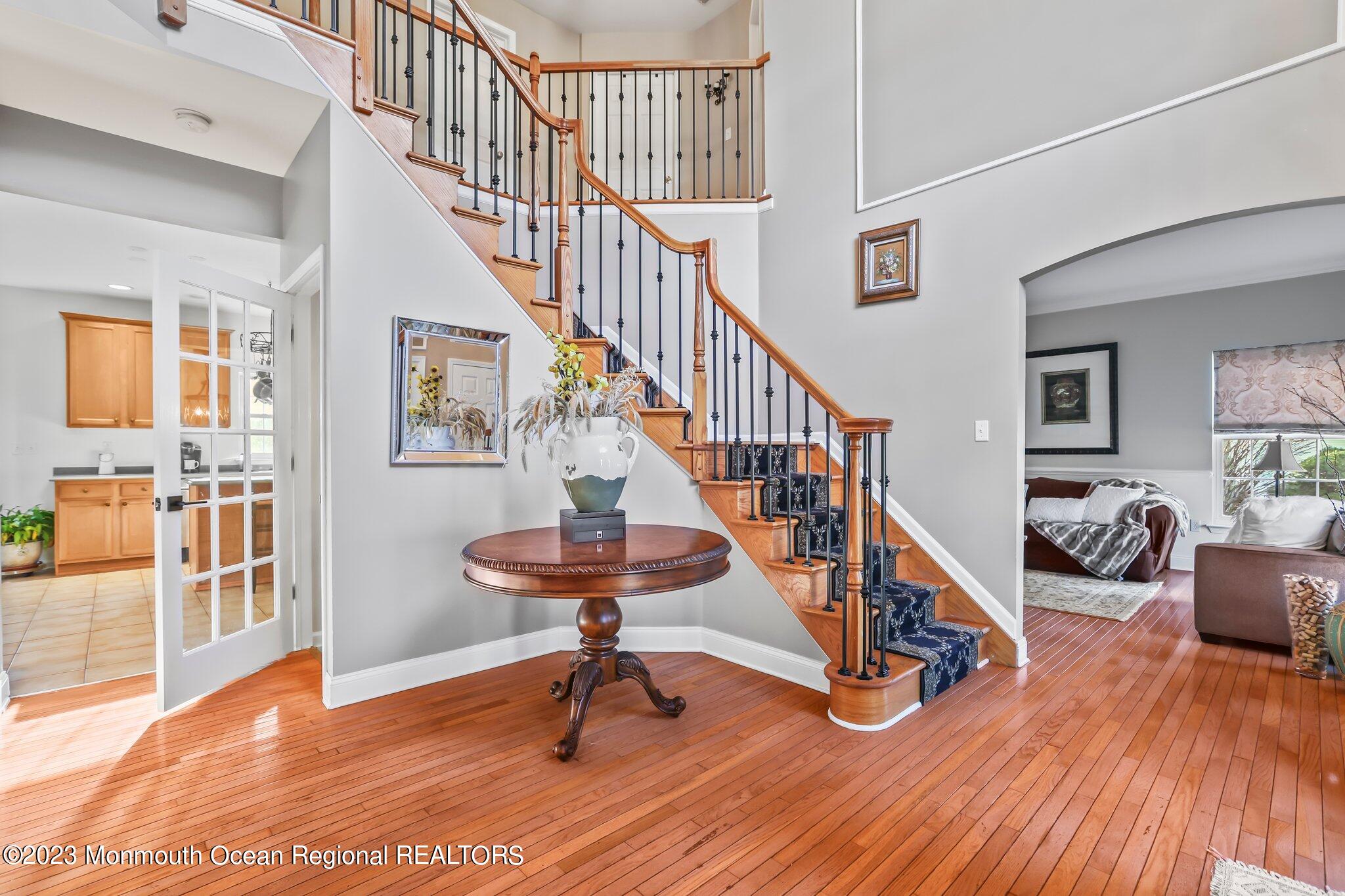 20 Round Hill Road Jackson, NJ 08527 - Photo 5 of 50 a view of entryway livingroom and hall with wooden floor