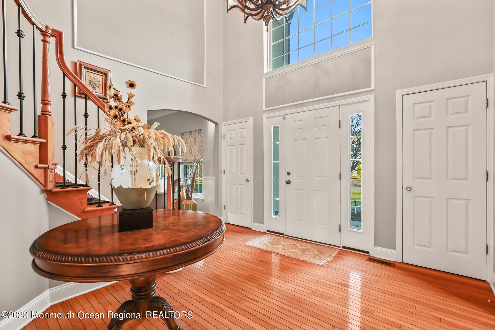 20 Round Hill Road Jackson, NJ 08527 - Photo 6 of 50 a view of a living room with a fireplace and wooden floor