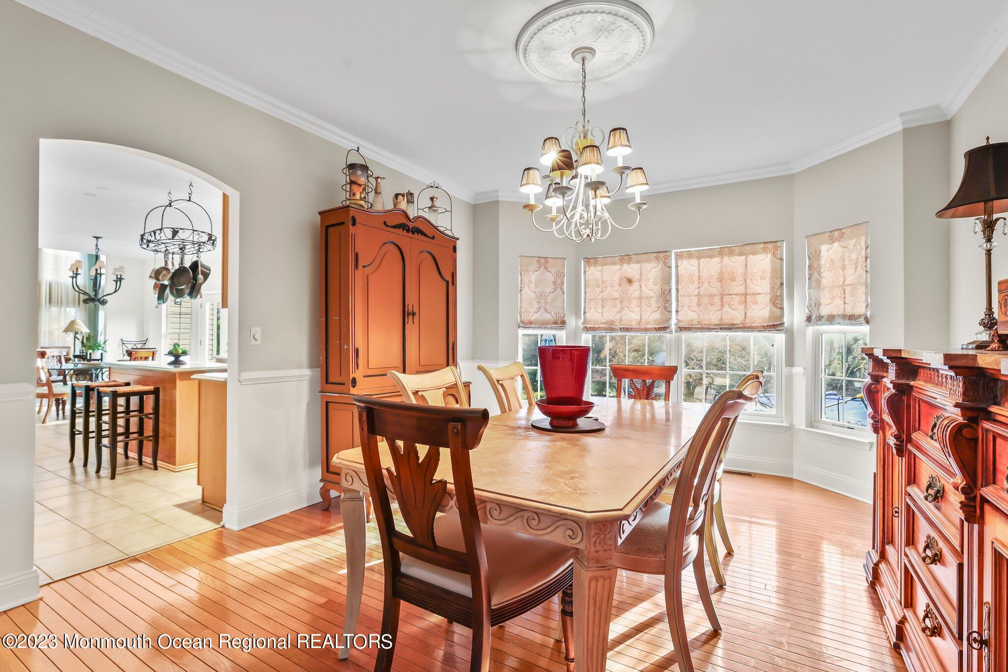 20 Round Hill Road Jackson, NJ 08527 - Photo 10 of 50 a view of a dining room with furniture window and wooden floor