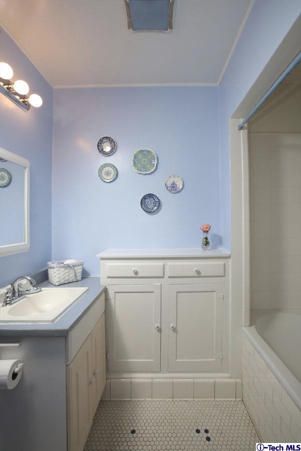 2118 Maiden Lane Altadena, CA 91001 - Photo 11 of 15 a bathroom with a sink a vanity and a mirror