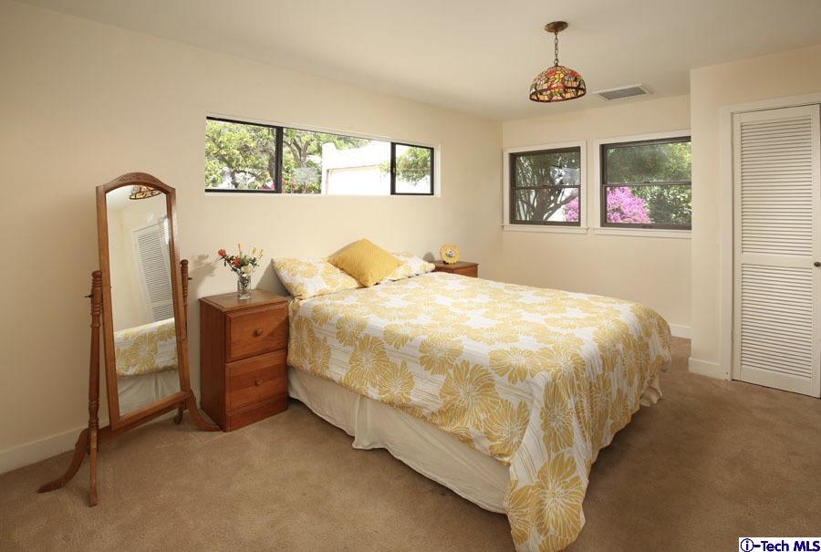 2118 Maiden Lane Altadena, CA 91001 - Photo 12 of 15 a bedroom with bed and window