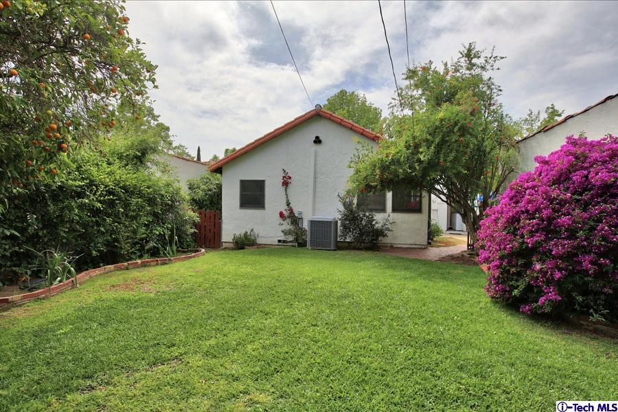 2118 Maiden Lane Altadena, CA 91001 - Photo 15 of 15 a backyard of a house with lots of green space and garden