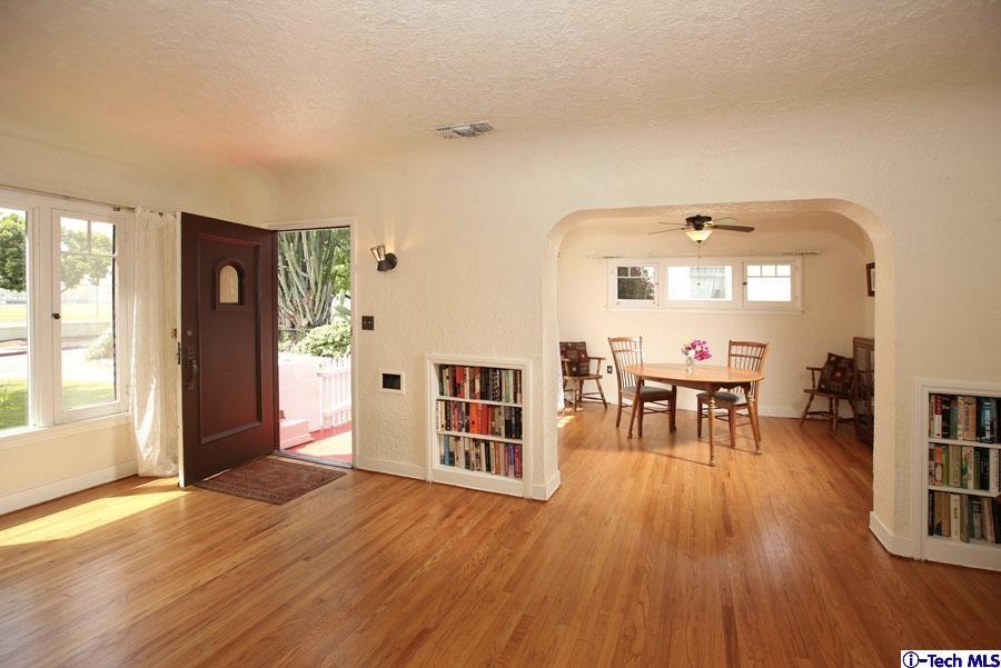 2118 Maiden Lane Altadena, CA 91001 - Photo 3 of 15 an empty room with wooden floor and furniture