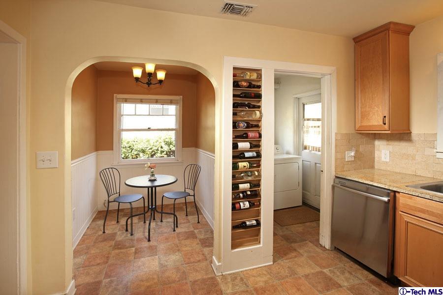2118 Maiden Lane Altadena, CA 91001 - Photo 7 of 15 a kitchen with granite countertop a refrigerator and a sink