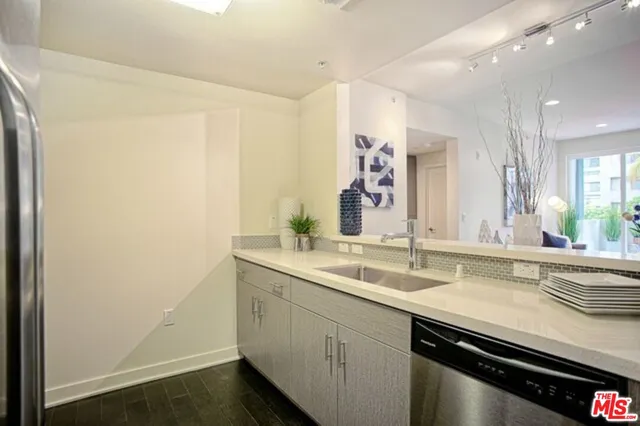 a view of a sink and a mirror