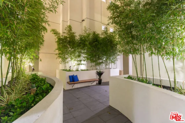 a view of swimming pool with a patio