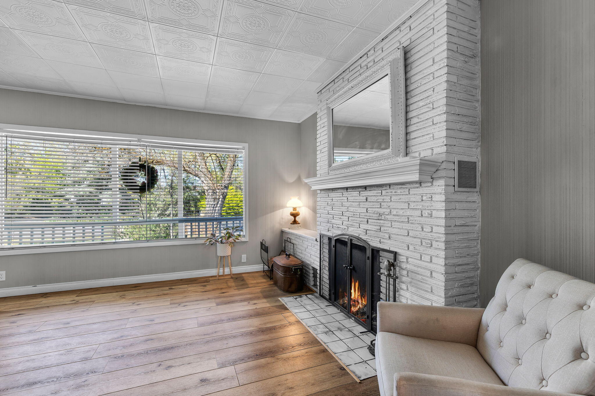 924 Northeast 9th Street Bend, OR 97701 - Photo 11 of 40 a living room with furniture and a fireplace