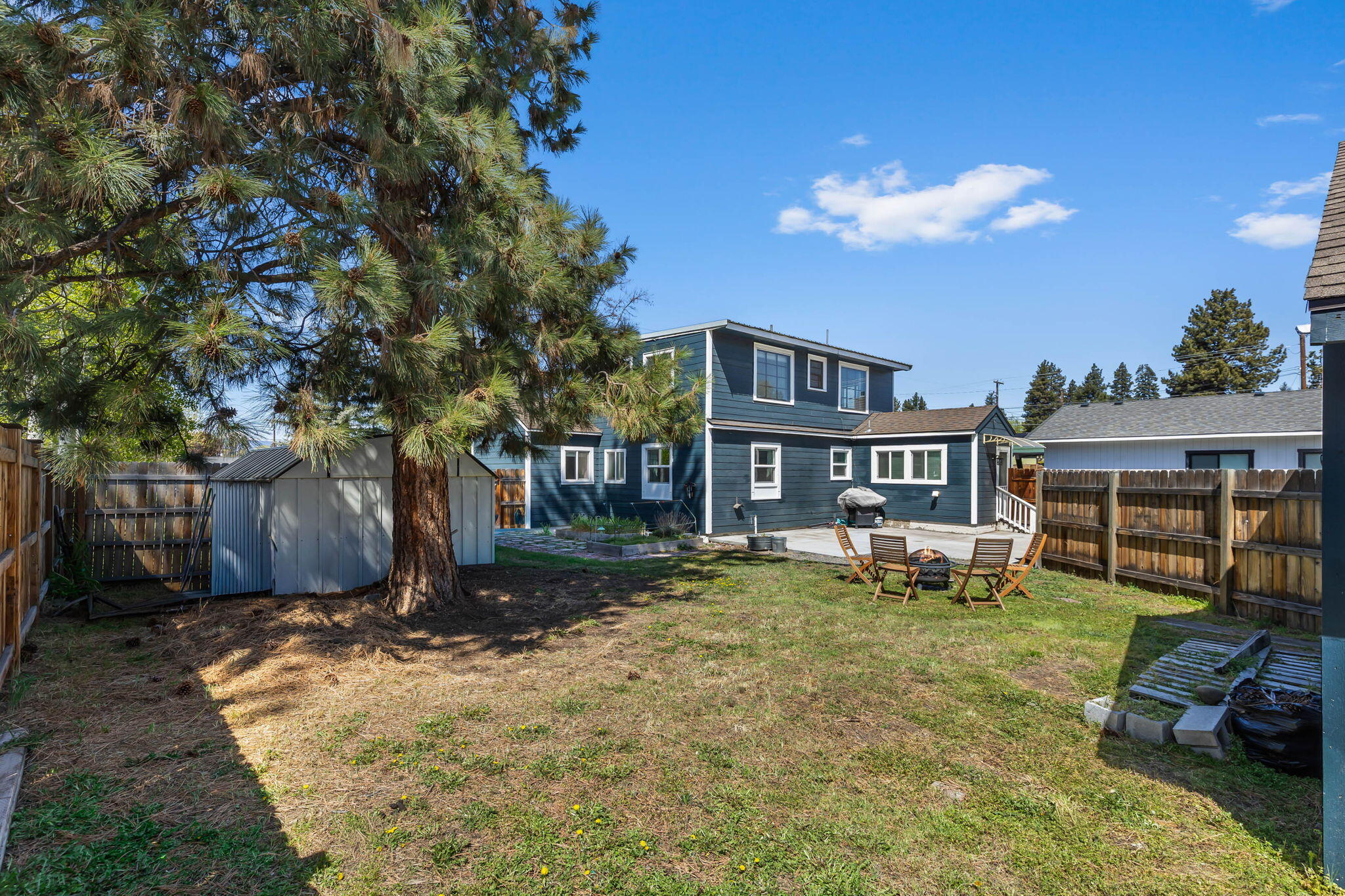 924 Northeast 9th Street Bend, OR 97701 - Photo 35 of 40 a view of a house with backyard porch and sitting area