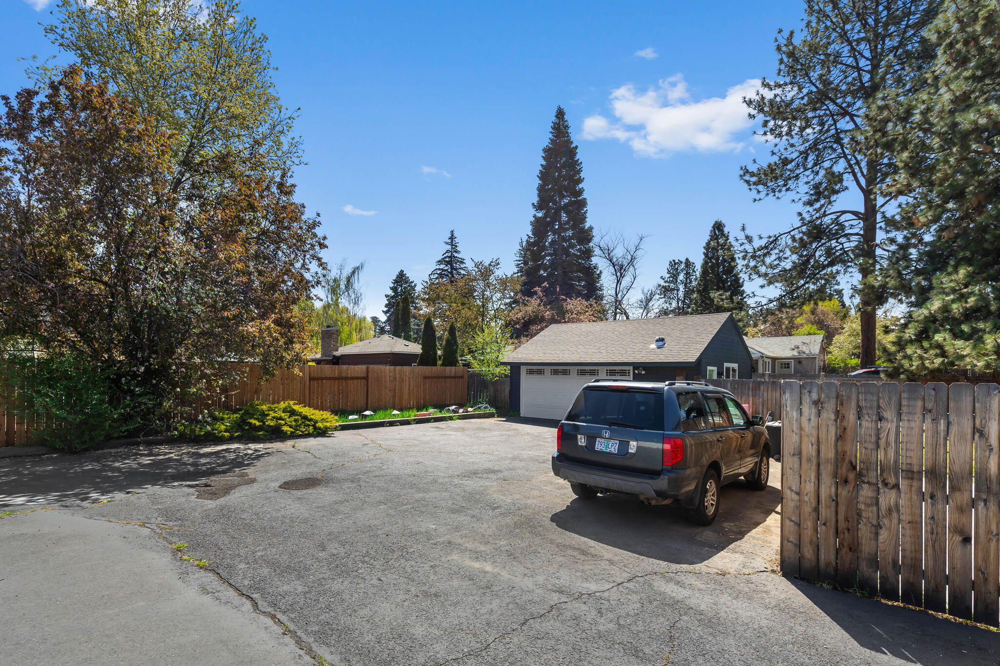 924 Northeast 9th Street Bend, OR 97701 - Photo 40 of 40 a car parked in front of a house