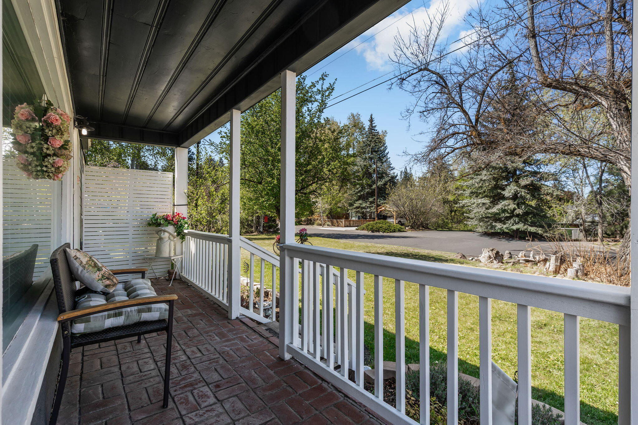 924 Northeast 9th Street Bend, OR 97701 - Photo 5 of 40 a view of a two chair in the balcony