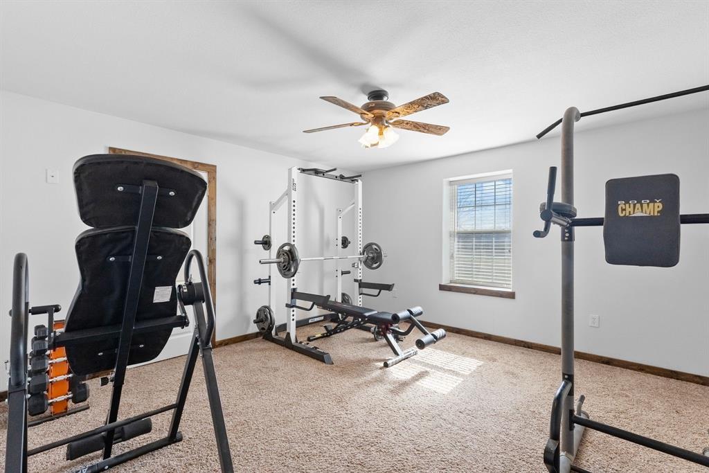 24 County Rd NW 1060 Talco, TX 75487 - Photo 23 of 40 a view of a room with gym equipment