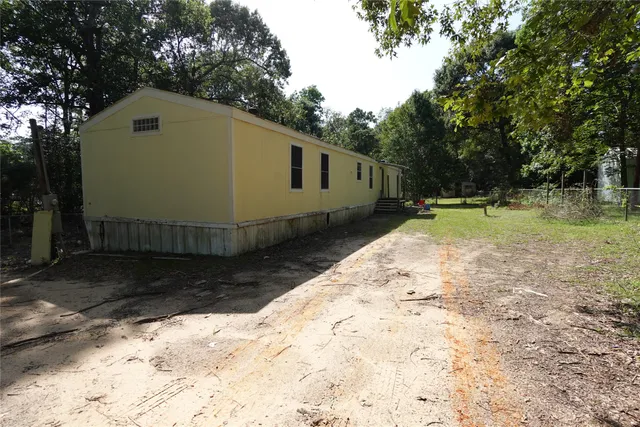 a house view with a yard