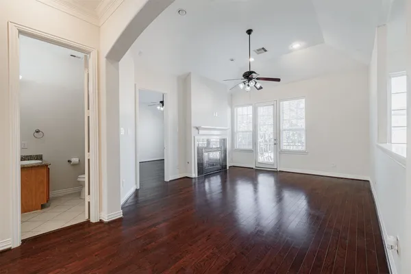 a kitchen with stainless steel appliances granite countertop a refrigerator a stove a sink and a microwave