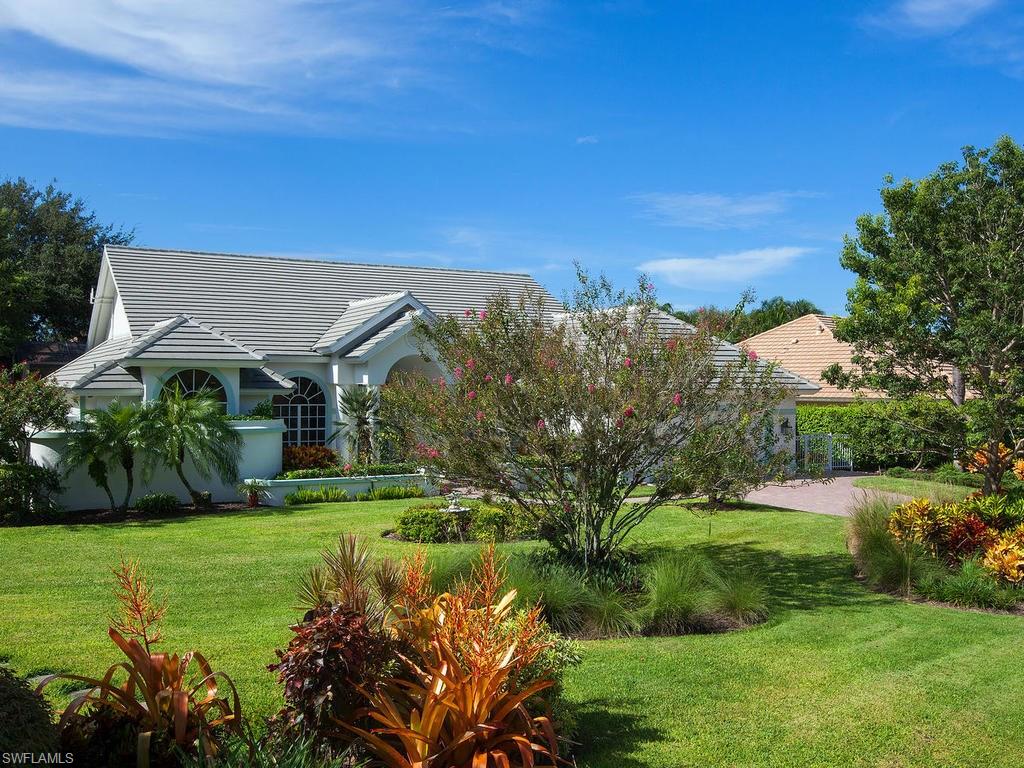 a view of a house with a big yard