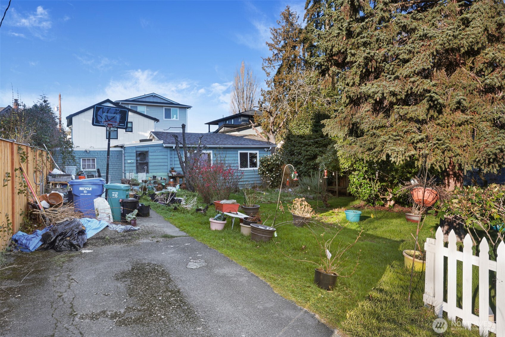 528 North 70th Street Seattle, WA 98103 - Photo 2 of 11 a view of a house with backyard and sitting area