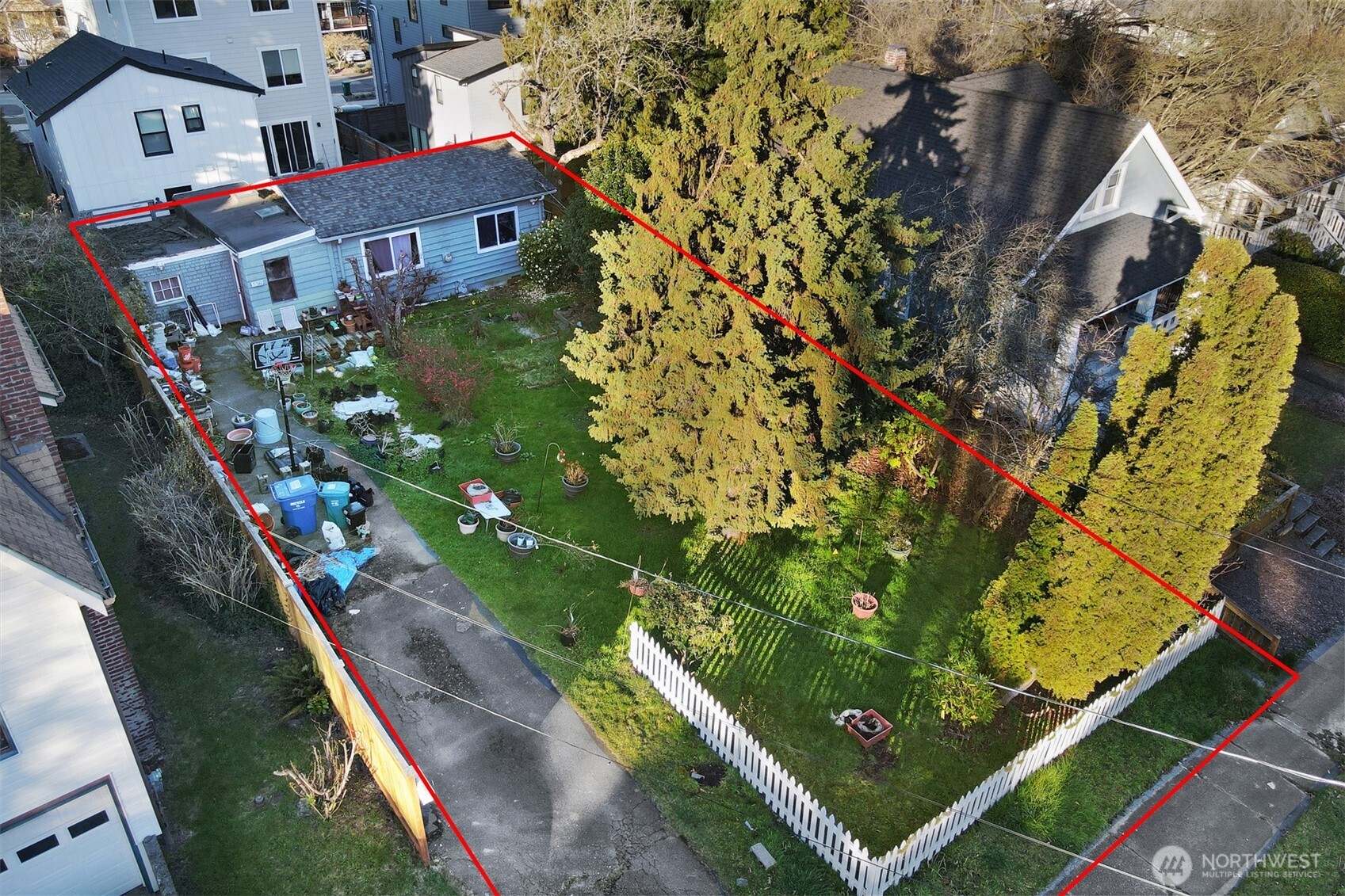 528 North 70th Street Seattle, WA 98103 - Photo 4 of 11 an aerial view of residential houses with outdoor space