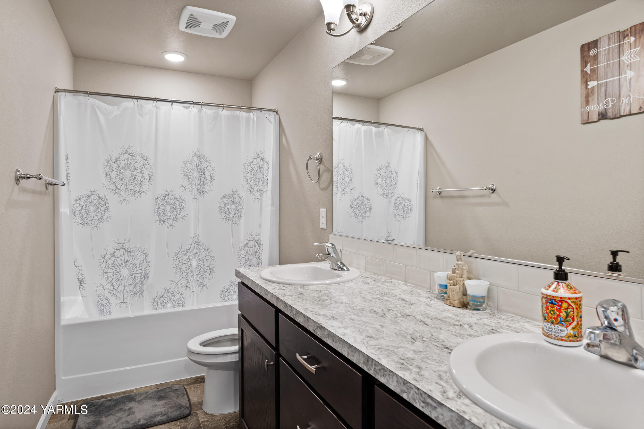 2100 Amber Loop Yakima, WA 98901 - Photo 21 of 25 a bathroom with a granite countertop sink mirror vanity and toilet