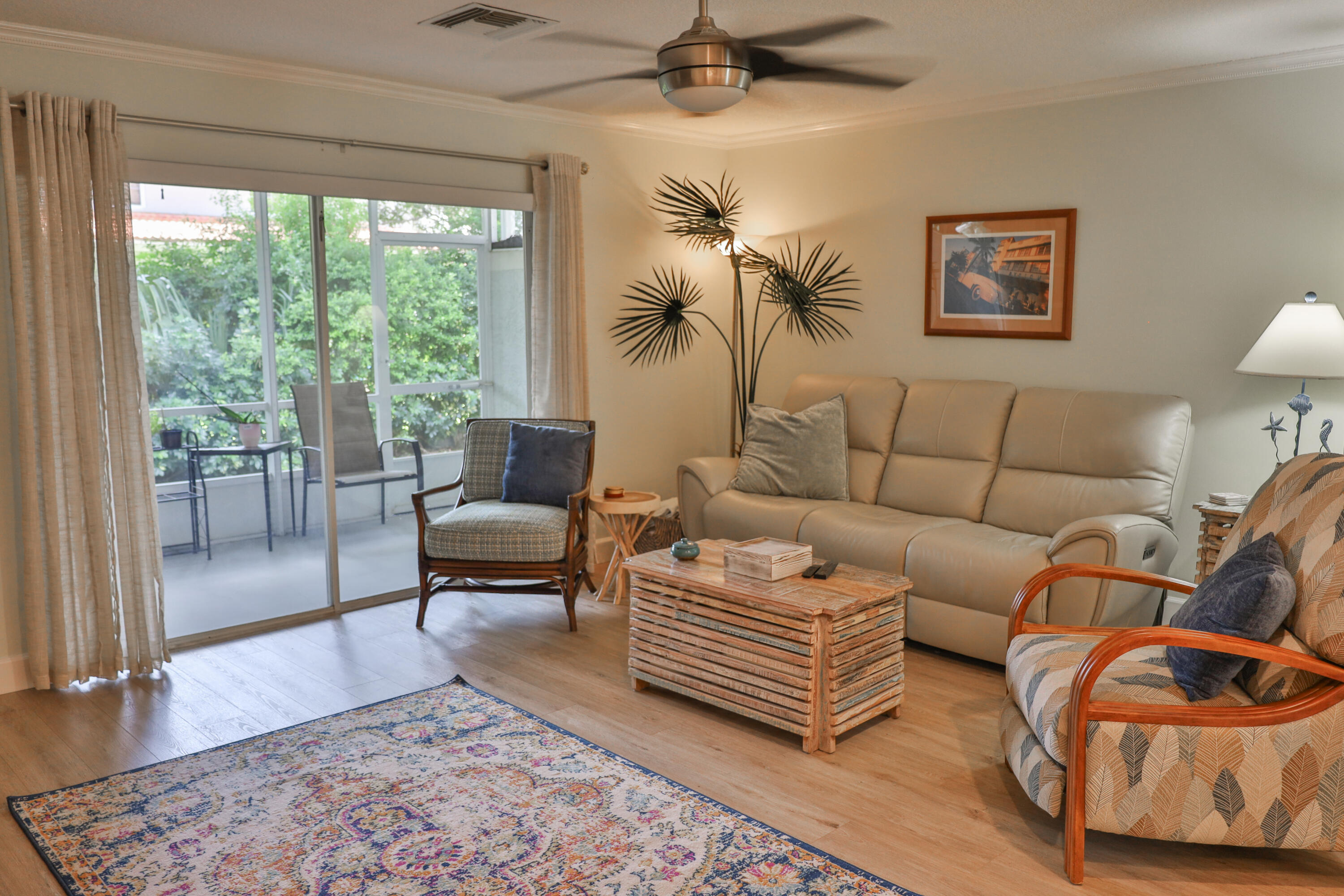 334 Timberwalk Trail Jupiter, FL 33458 - Photo 4 of 51 a living room with furniture and a rug