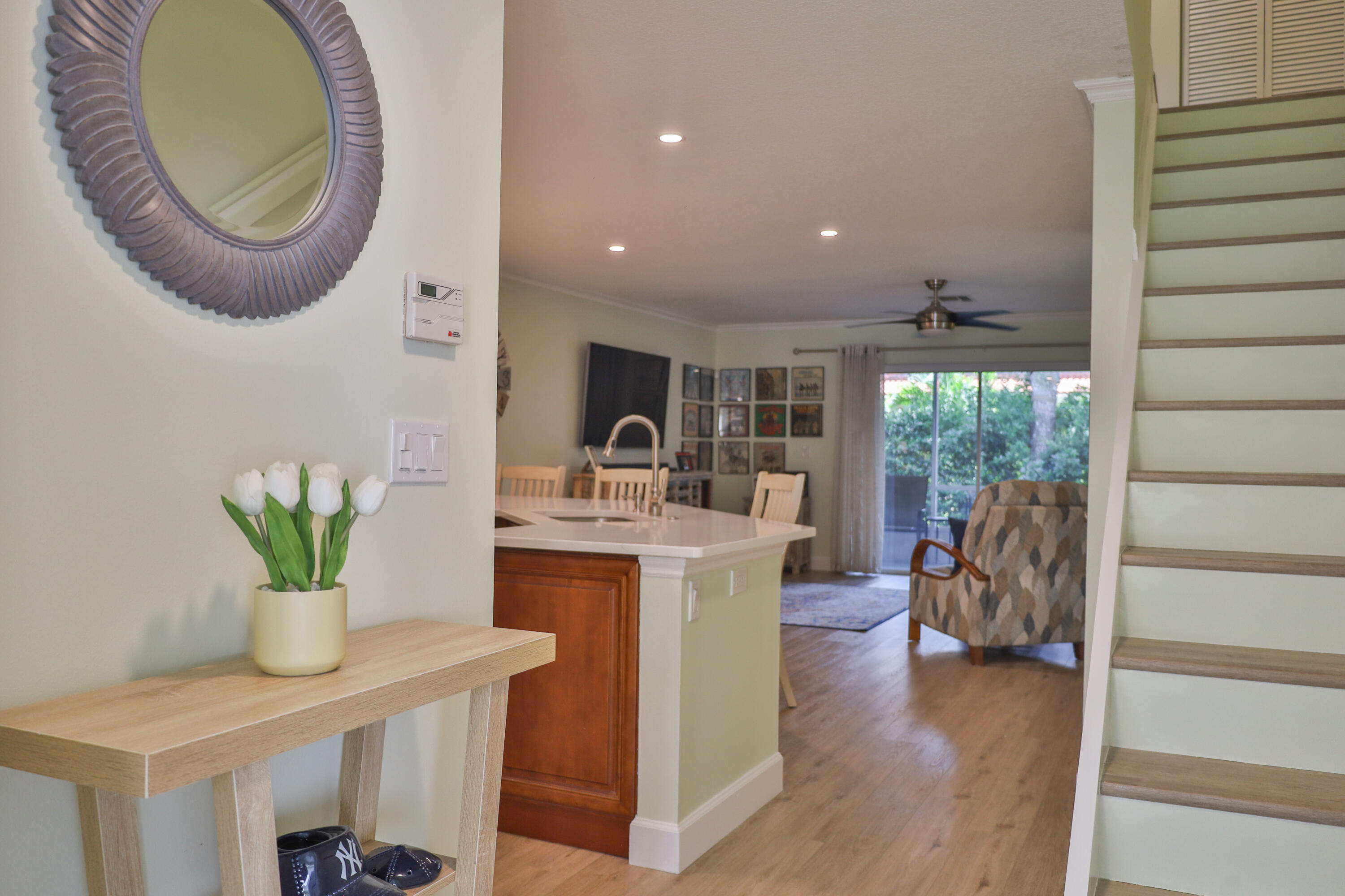 334 Timberwalk Trail Jupiter, FL 33458 - Photo 7 of 51 a living room with furniture and a potted plant