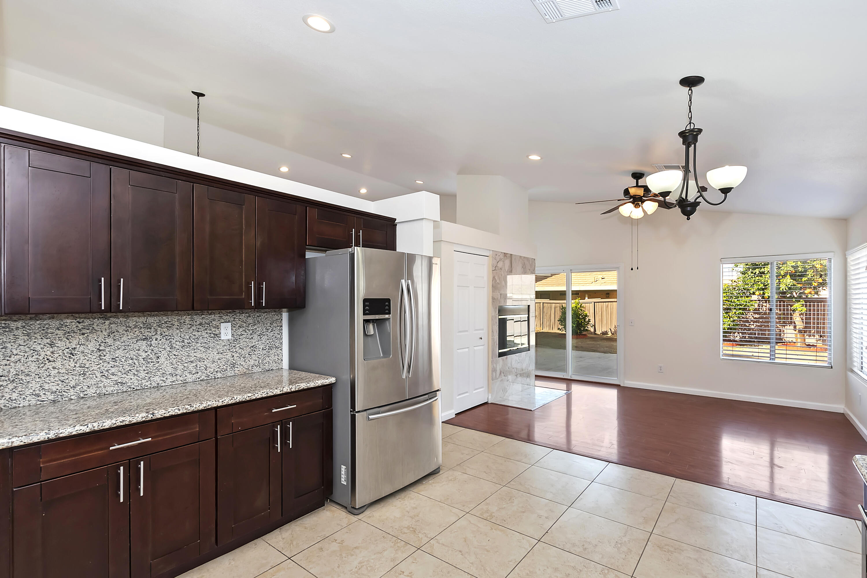 80472 Suncastle Road Indio, CA 92201 - Photo 16 of 32 a kitchen with stainless steel appliances granite countertop a refrigerator and a sink