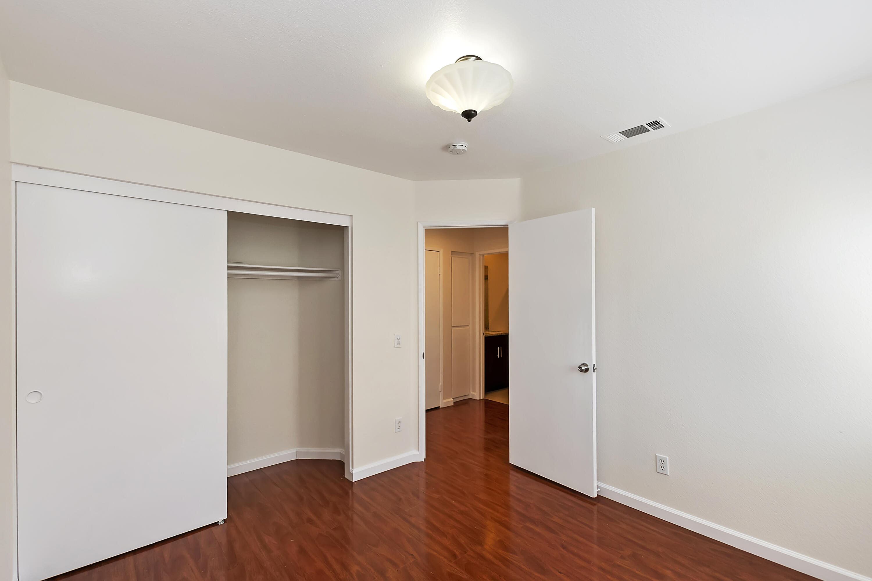 80472 Suncastle Road Indio, CA 92201 - Photo 21 of 32 a view of empty room with wooden floor