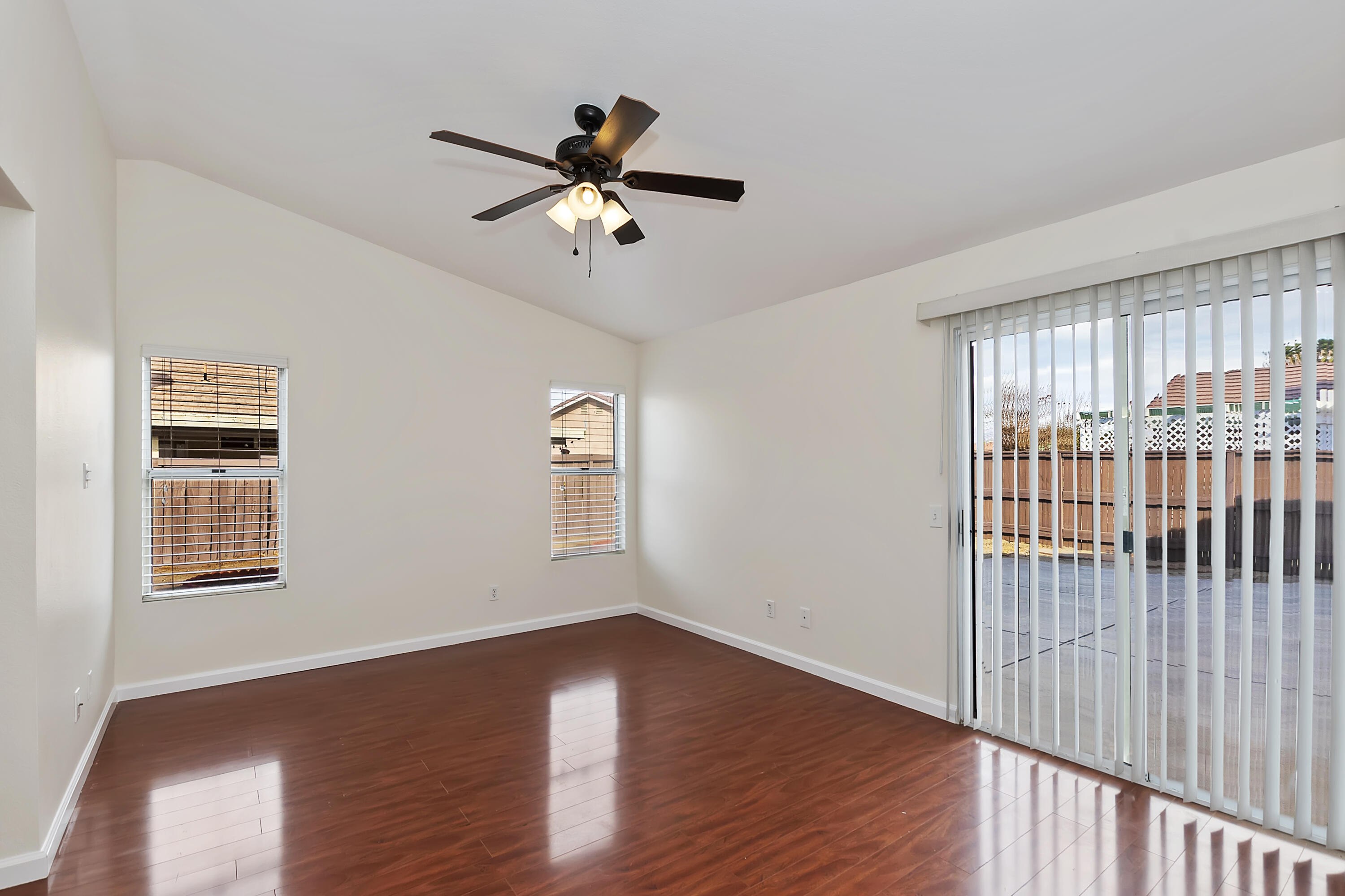 80472 Suncastle Road Indio, CA 92201 - Photo 24 of 32 a view of empty room with wooden floor and fan