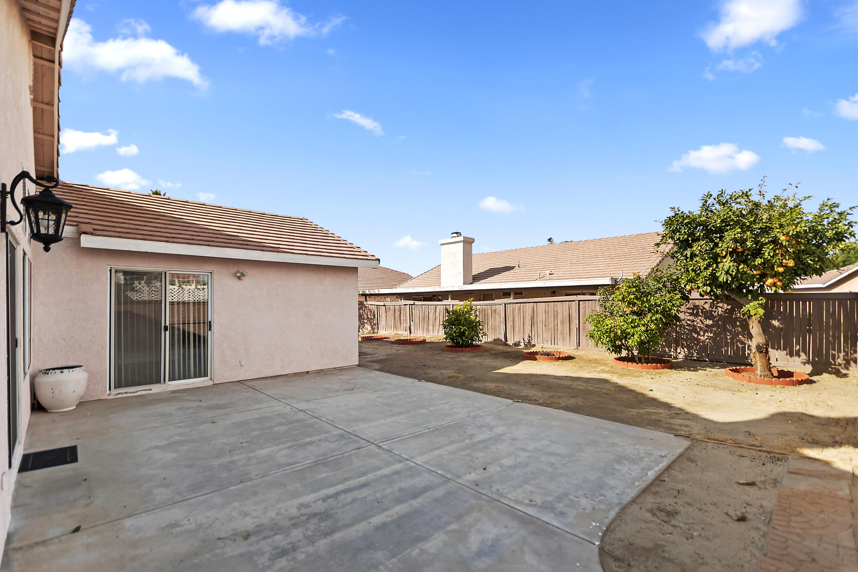 80472 Suncastle Road Indio, CA 92201 - Photo 29 of 32 a view of a house with a yard and garage