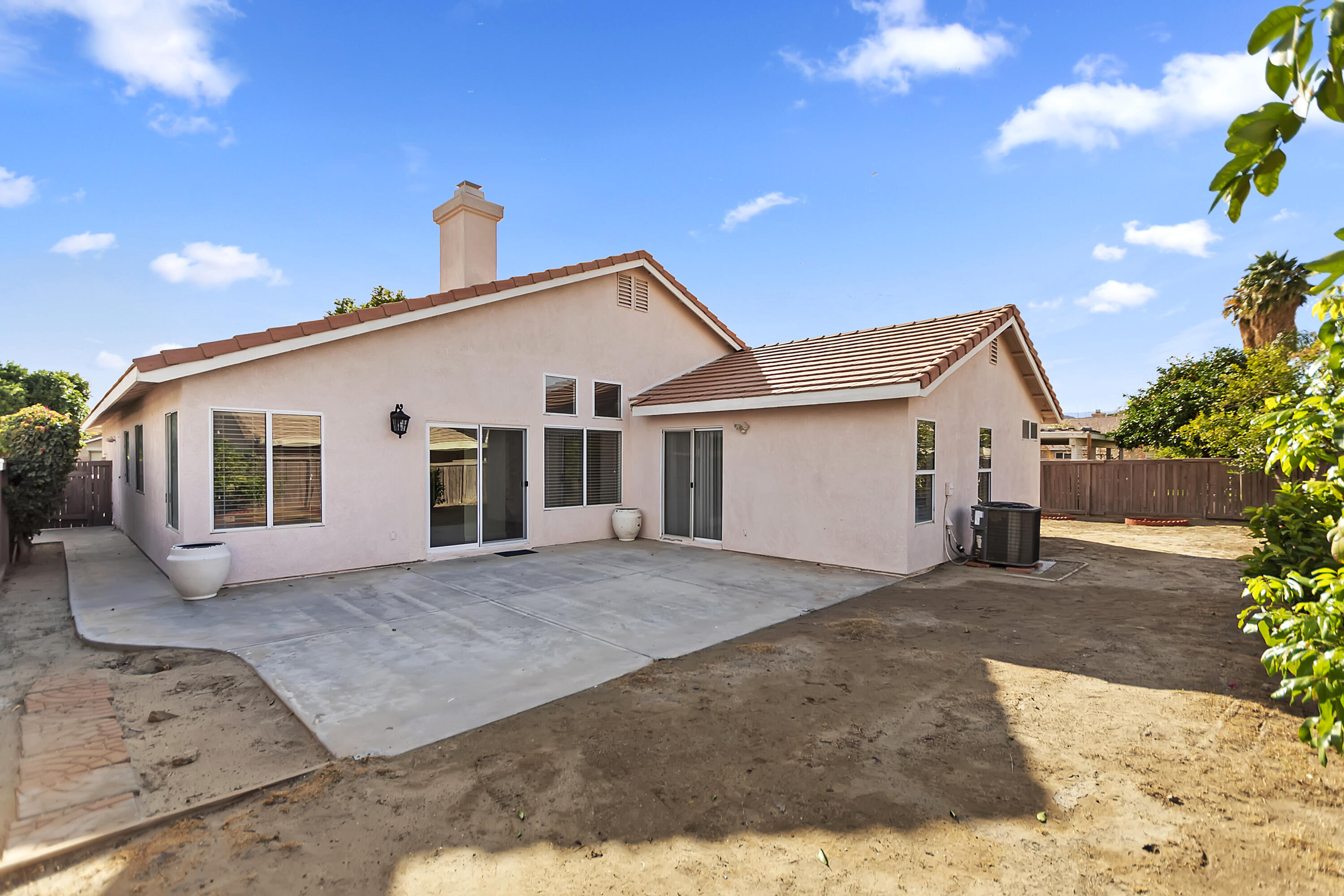 80472 Suncastle Road Indio, CA 92201 - Photo 30 of 32 a view of a house with a patio