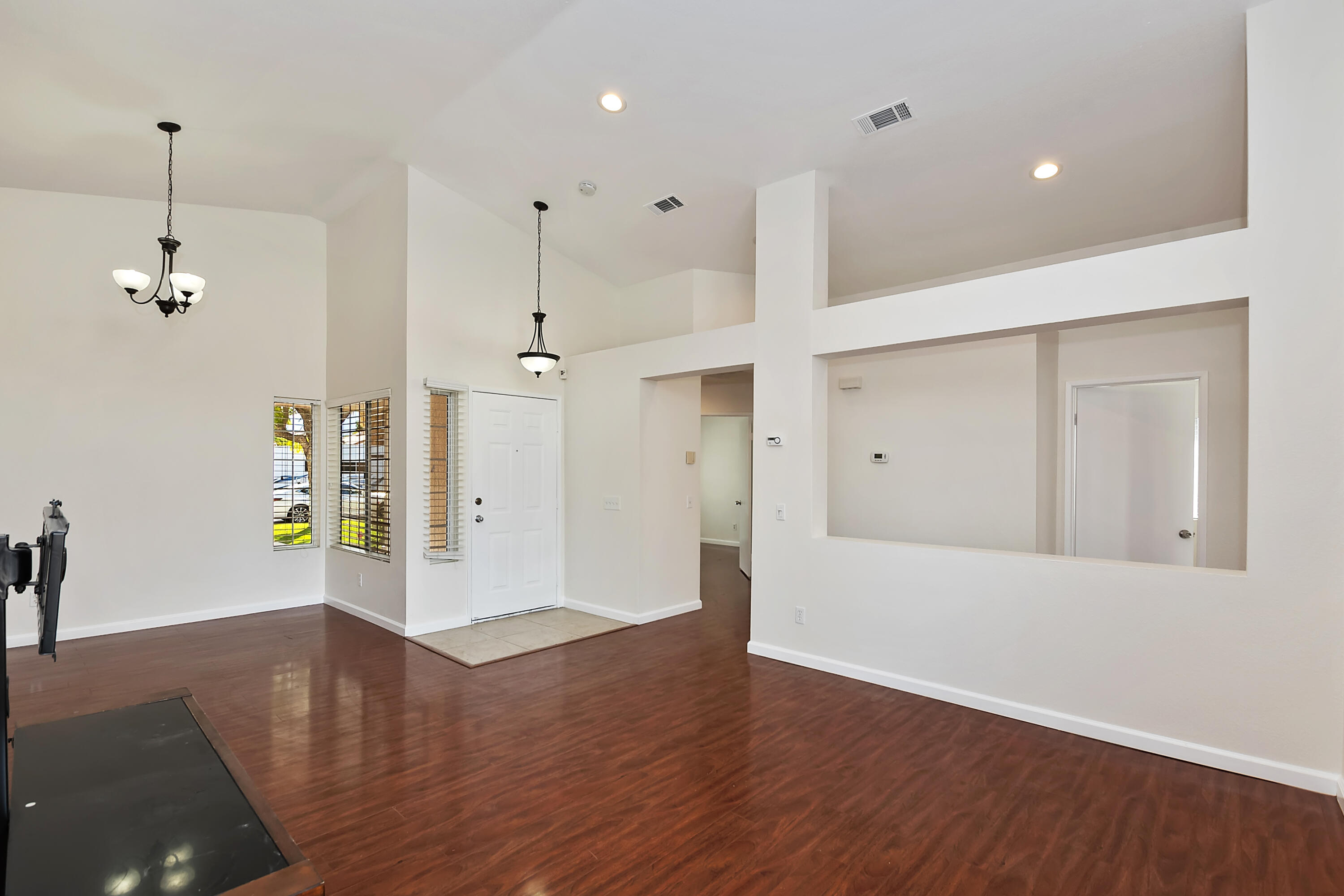 80472 Suncastle Road Indio, CA 92201 - Photo 6 of 32 a view of empty room with wooden floor