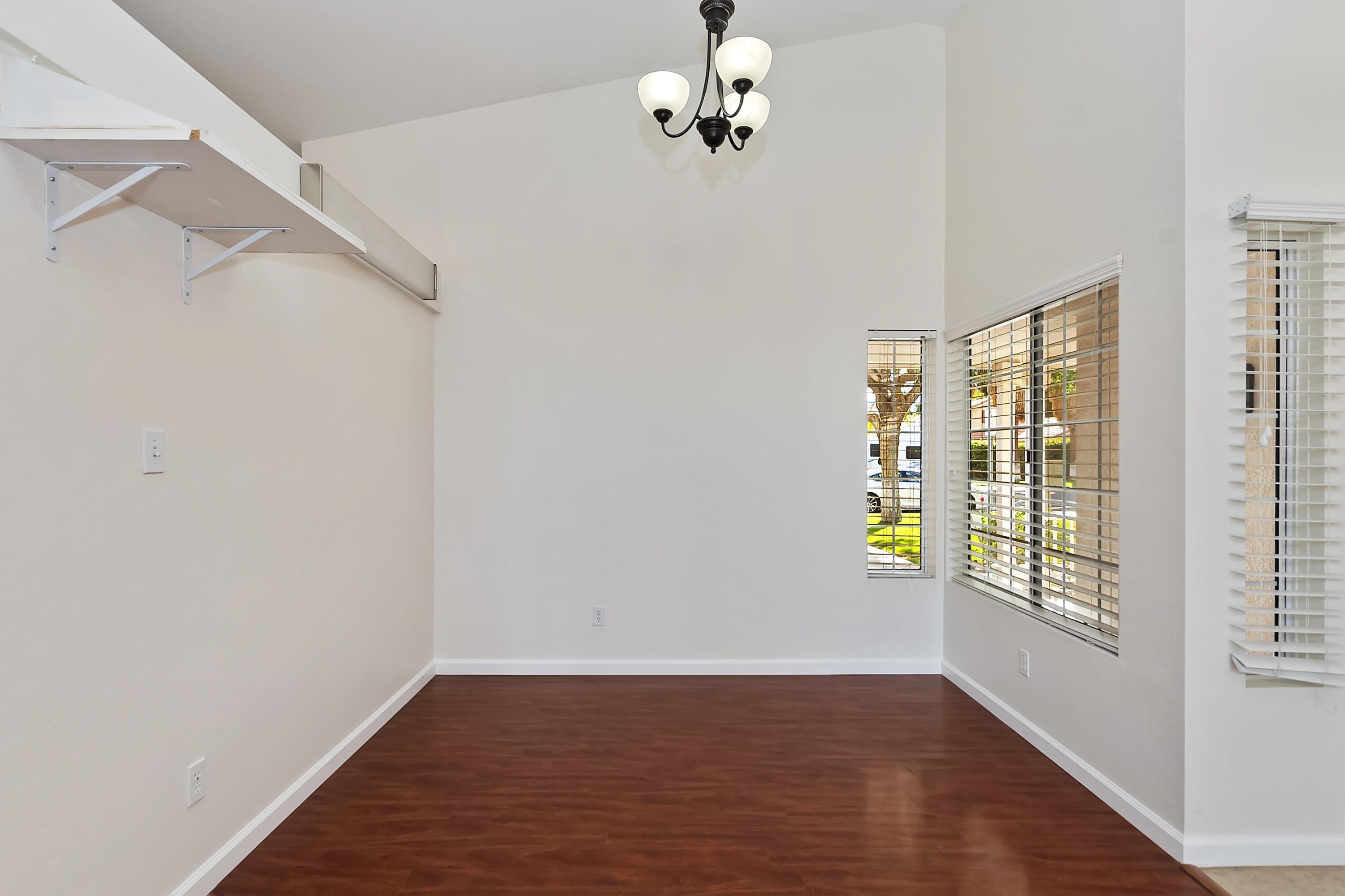 80472 Suncastle Road Indio, CA 92201 - Photo 8 of 32 a view of an empty room with a window