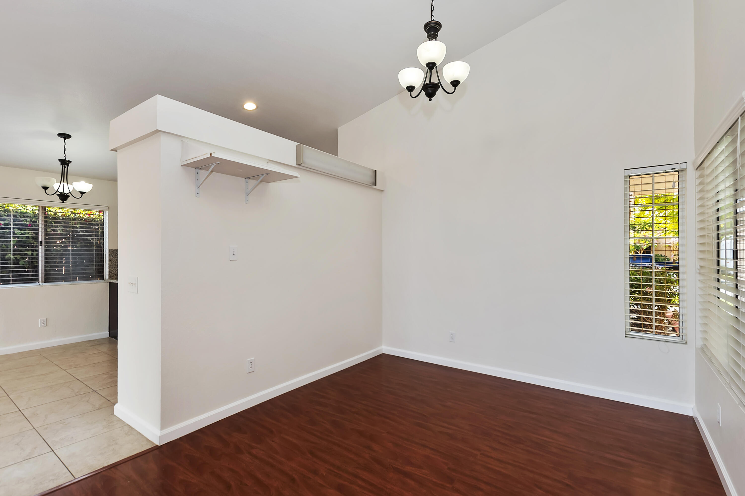 80472 Suncastle Road Indio, CA 92201 - Photo 9 of 32 wooden floor in an empty room with a window