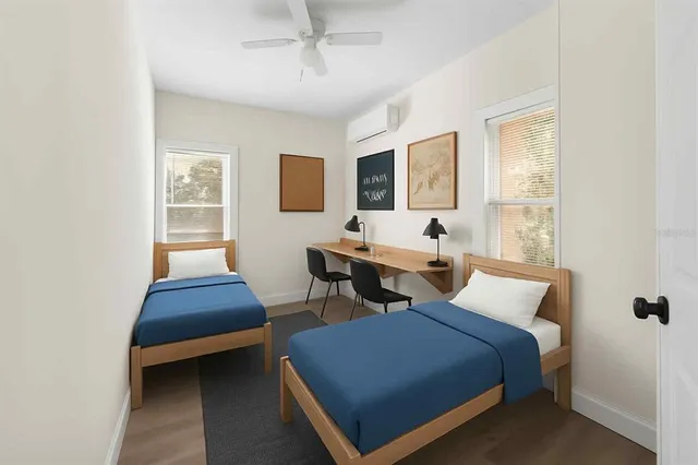 a bedroom with furniture and windows