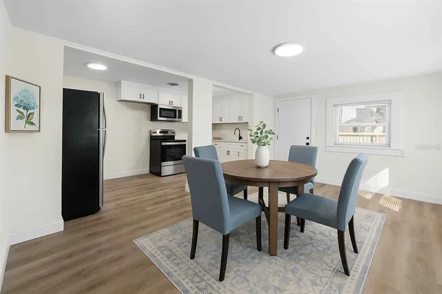 a view of a dining room with furniture