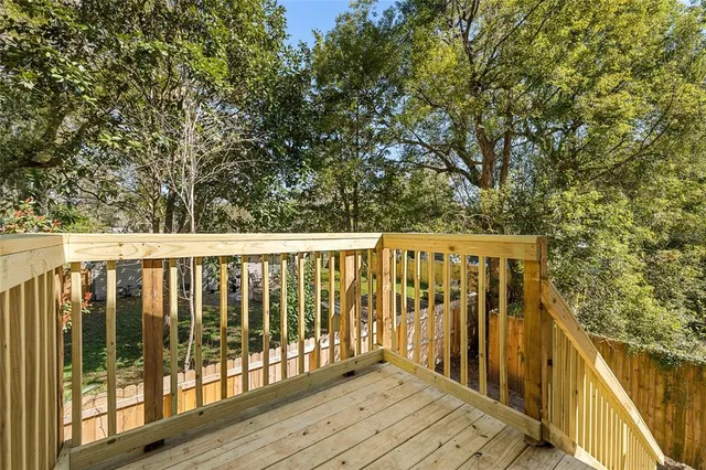 a view of a wooden fence
