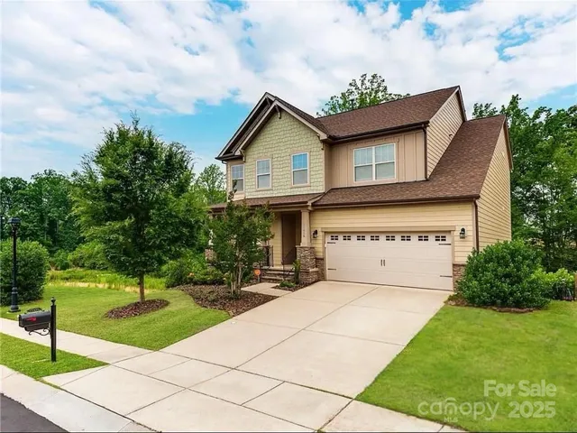 a house view with a garden space