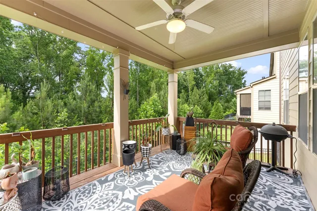 a view of a patio with furniture