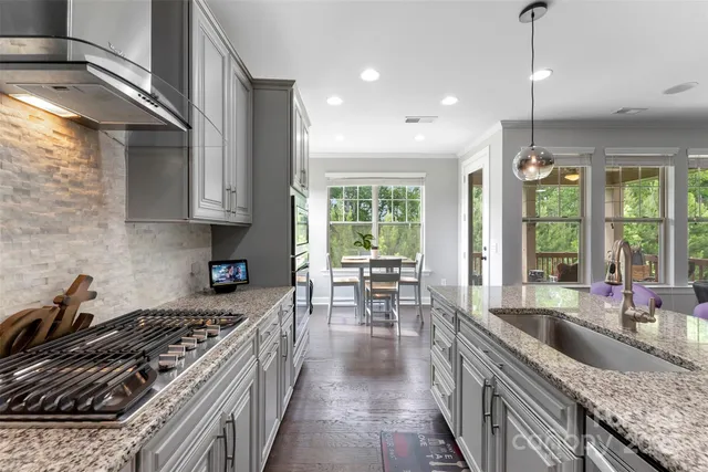 a kitchen with granite countertop lots of counter top space