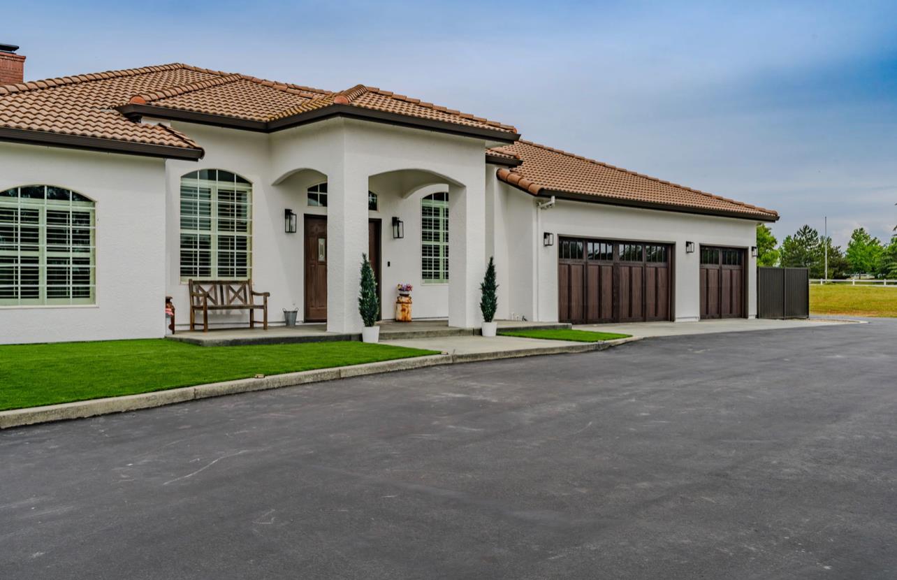 5600 Ferseyna Way Valley Springs, CA 95252 - Photo 13 of 94 a view of a house with a yard and garage