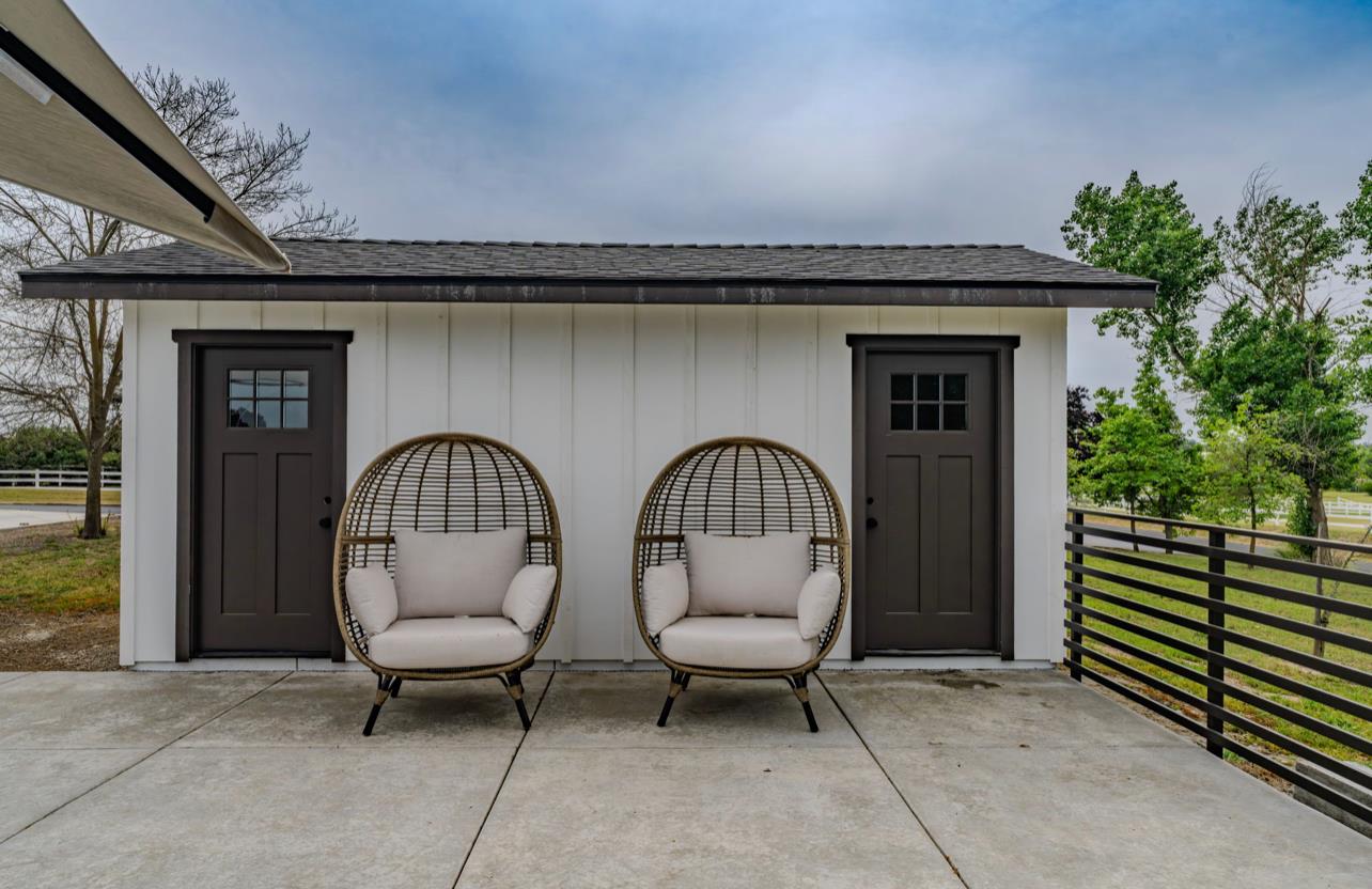 5600 Ferseyna Way Valley Springs, CA 95252 - Photo 25 of 94 a couple of potted plants in front of a house