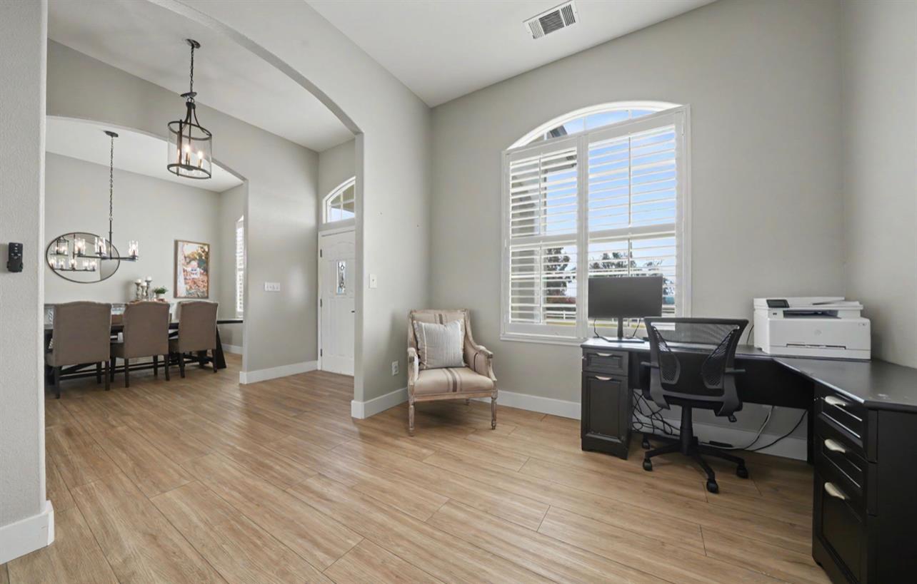 5600 Ferseyna Way Valley Springs, CA 95252 - Photo 48 of 94 a view of a workspace with furniture and a window