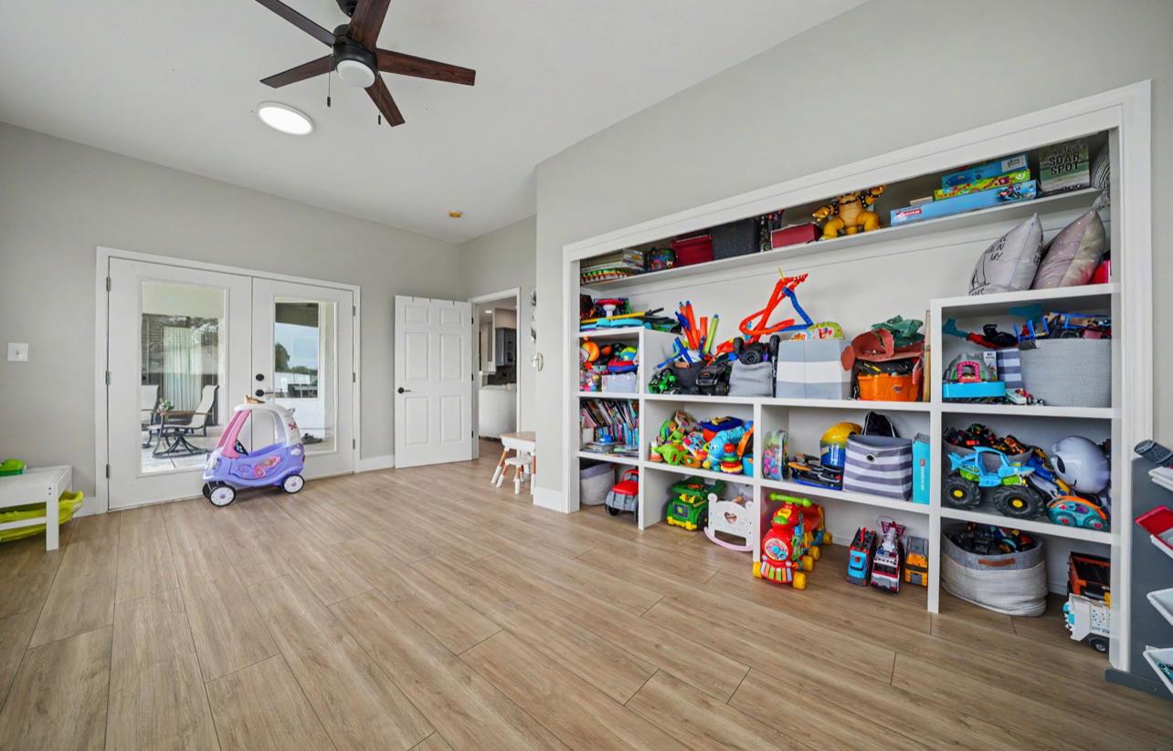 5600 Ferseyna Way Valley Springs, CA 95252 - Photo 72 of 94 a view of play room with toys and wooden floor