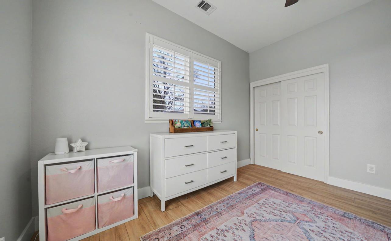 5600 Ferseyna Way Valley Springs, CA 95252 - Photo 79 of 94 a room with a baby crib and dresser