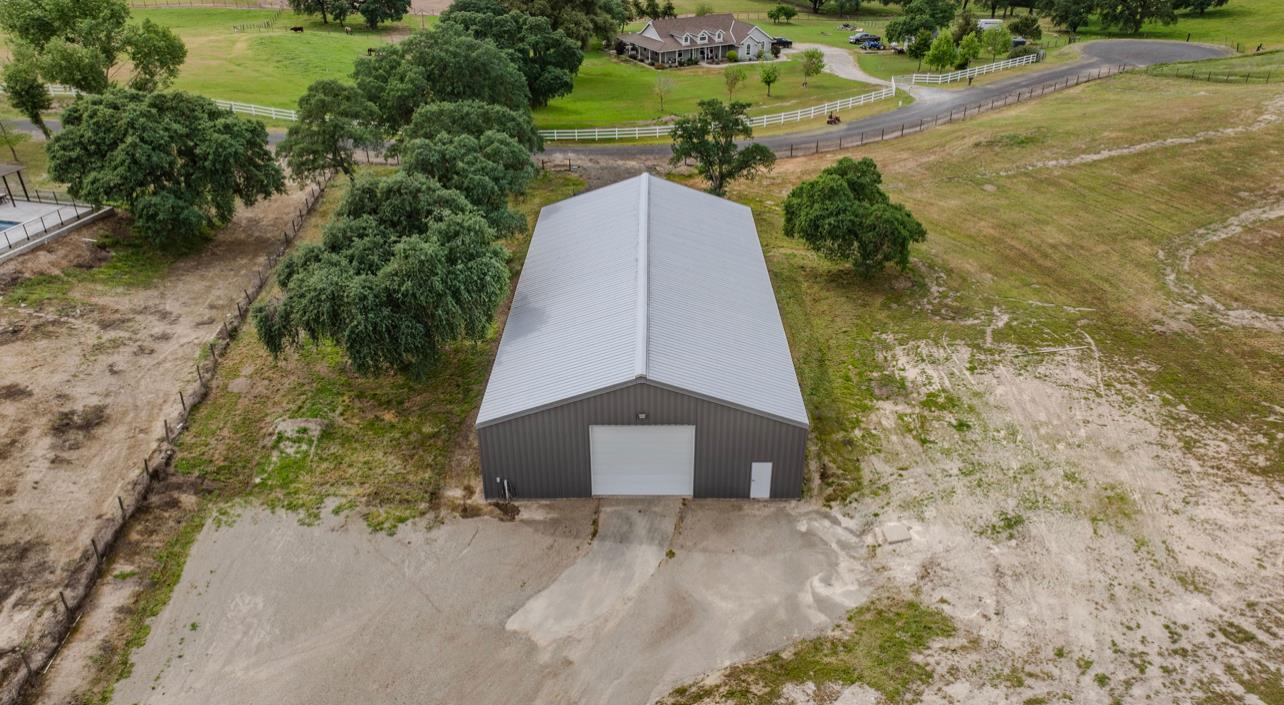 5600 Ferseyna Way Valley Springs, CA 95252 - Photo 8 of 94 a aerial view of a house with a yard and large tree