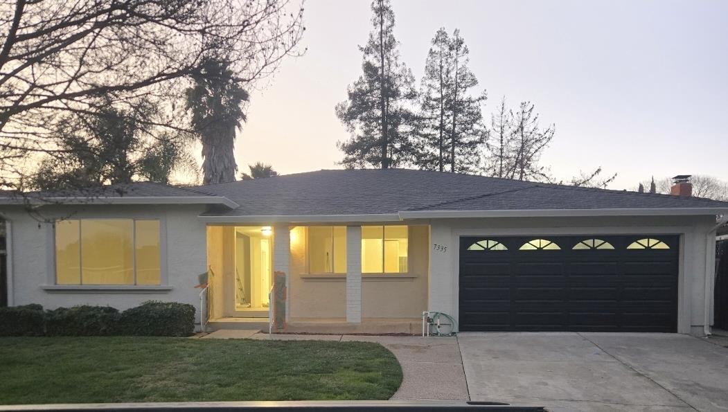 a front view of a house having yard