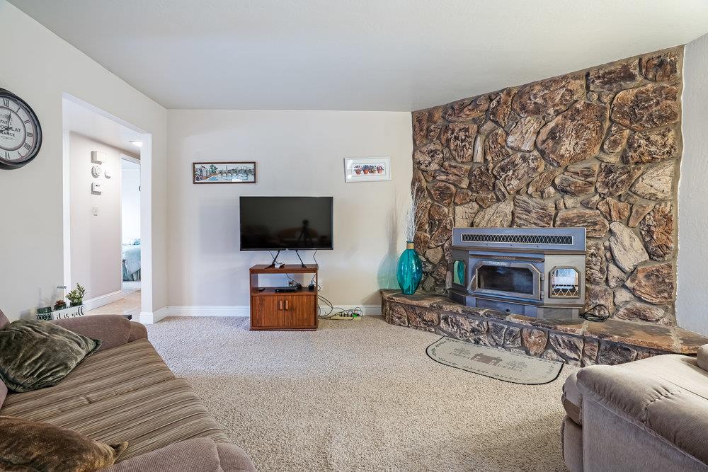 140 Rays Circle Hollister, CA 95023 - Photo 14 of 31 a living room with furniture and a flat screen tv